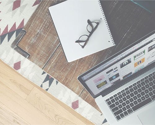 open-laptop-on a wooden desk