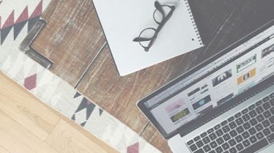 open-laptop-on a wooden desk